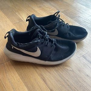 Very well worn Nike sneakers